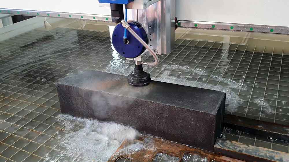 Abrasive water jet cutting concrete block