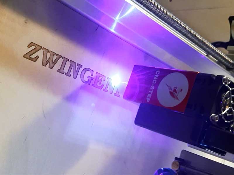 vLaser engraving on wood