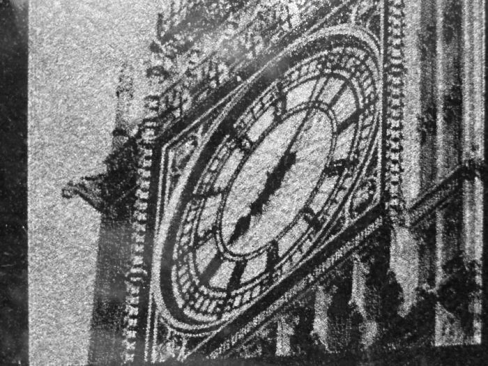 picture engraving of a clock on granite