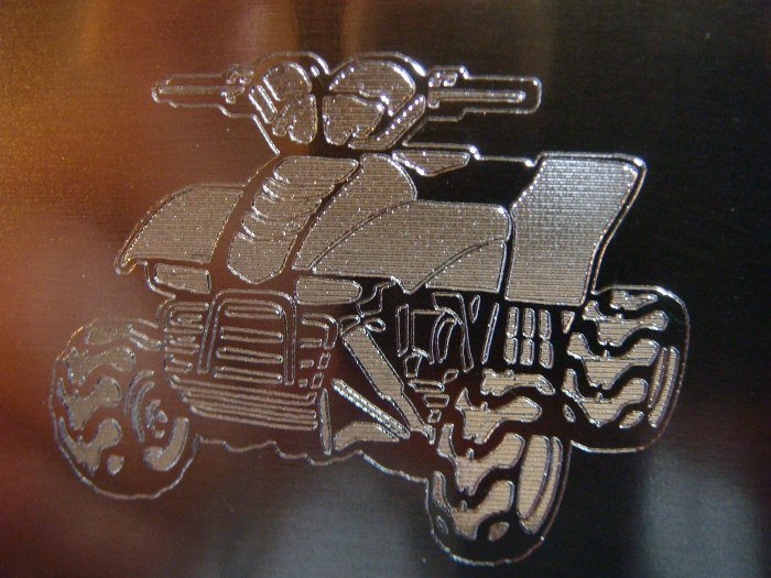 Scratch engraving quad bike
