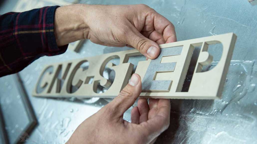 Lettering in ceramic tile Water Jet cut